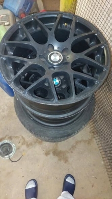 Four 18-inch rims with new tires 265/35/18