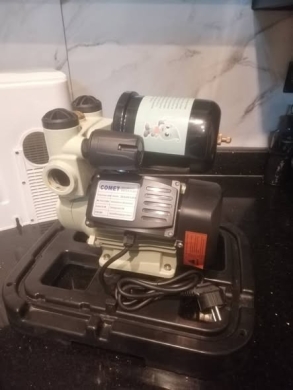 Used Water Pressure Pump with Sun and Rain Cover