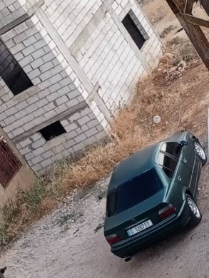 Black BMW 320 registered with ID, available in Baalbek