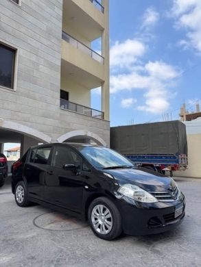 Nissan Tida 2010 — 2