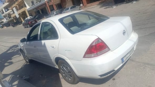 Nissan Sunny 2011 — 3