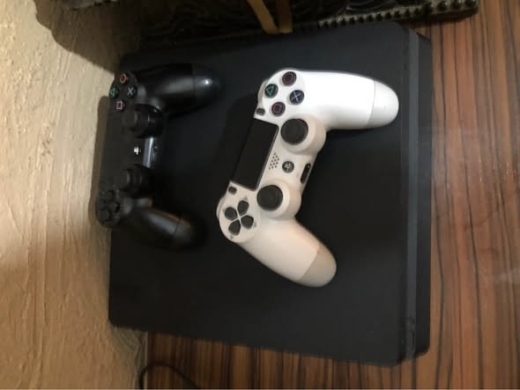 PS4 with two controllers