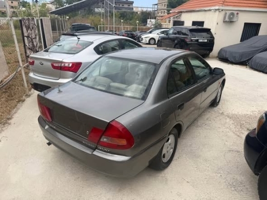 Mitsubishi Lancer 1998 — 2