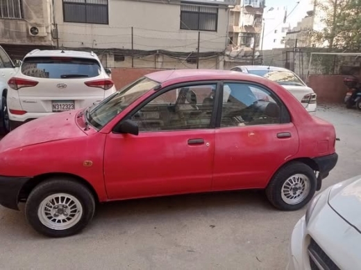 Mazda 121 model 1996 — 5
