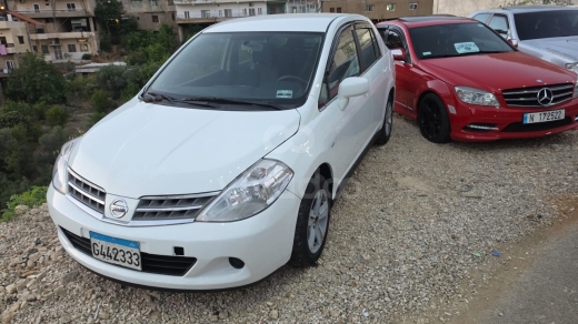 نيسان تيدا 2010 أبيض/أسود نظيفة جداً | Nissan Tida 2010 White/Black Clean — 3