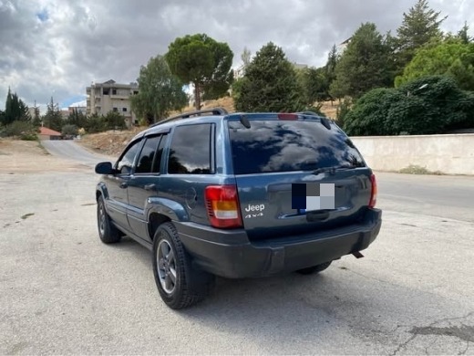 Jeep Grand 2002 — 2