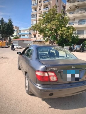 Nissan Sunny 2003 — 5