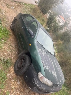 Nissan Almera 1999 — 3