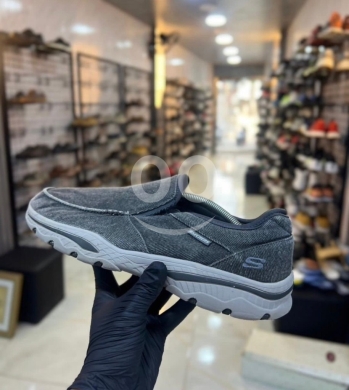 Clothes, Footwear & Accessories in Al Dahye - Skechers Relaxed Fit Canvas Slip-Ons - Men&#039;s Charcoal Grey - Size 43 - Original & Comfortable