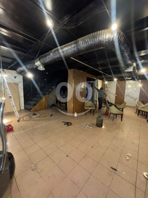 Commercials for rent in Hadeth - محل للإيجار في الجاموس ١٠٠ م² | ٤ واجهات قزاز على الخط العام