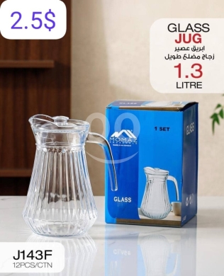 Kitchen appliances in Taalabaya - إبريق عصير زجاج مضلع طويل سعة 1.3 ليتر | 1.3L Fluted Glass Juice Jug with Lid