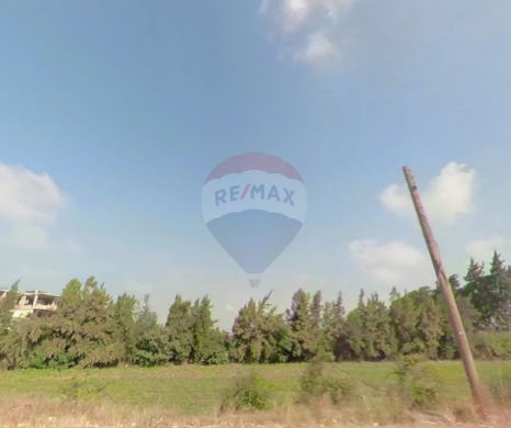 Lands for sale in Aicha Bakkar - R9-3249 7,000 m² agricultural land for sale in Akkar Kolayaat Airport أرض للبيع في عكار مطار القليعات - 7,000 متر مربع زراعية