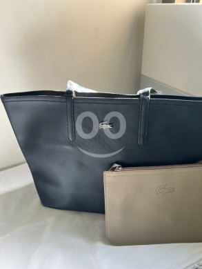 Clothes, Footwear & Accessories in Abou Samra - طقم حقيبة "Lacoste" سوداء مع محفظة صغيرة أنيقة | Elegant Lacoste Tote Bag with Pouch Set