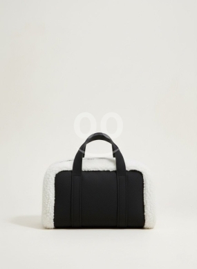 Clothes, Footwear & Accessories in Nadim EL Jisr - حقيبة يد صغيرة بتصميم شتوي دافئ باللونين الأسود والأبيض | Mini Black and White Faux Fur Handbag