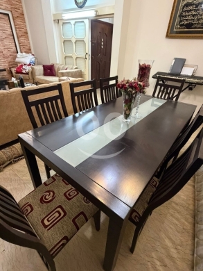 Dining room in Dawhet Aramoun - طاولة سفرة مودرن خشب مع ٨ كراسي بحالة ممتازة | Modern Dining Table with 8 Chairs