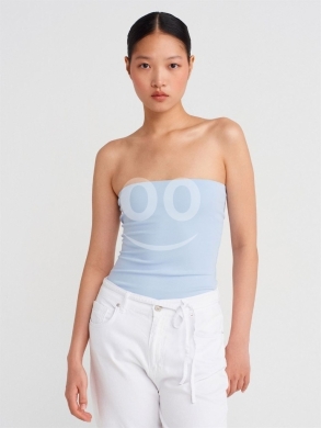 توب بدون أكمام بلون كريمي ناعم من Styllana Store | Chic Cream Tube Top — 4