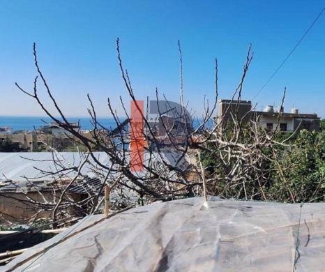 R9-3497 Land for Sale in Halat, Jbeil District – 1000 m², Highway