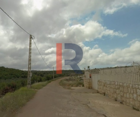 R9-3580 Land for Sale in Nakhleh – Koura, 1865 m², Villas Area, Zoning 20/40 — 2