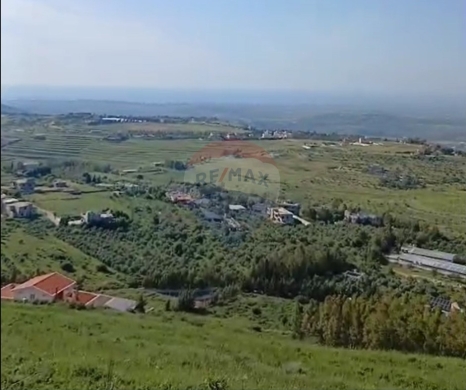 Lands for sale in Tal Bireh - R9-3679 Land for Sale in Bireh &ndash; Akkar, 9163 m&sup2; Residential, Panoramic Viewأرض للبيع في بيريه عكار &ndash; 9163 م&sup2; سكنية، إطلالة بانورامية