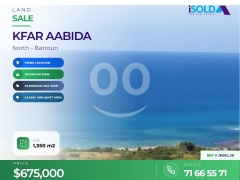 A 1350 m2 land having an open mountain/sea view for sale in Kfar Aabida /JK09.L.18