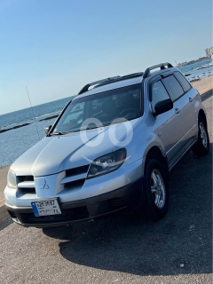 &rlm;Mitsubishi Outlander 2004
