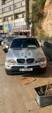 BMW in Tripoli - BMW X5 بيت مختم مسكر زوايد فضي بحالة ممتازة - BMW X5 Closed Ring Silver SUV Car