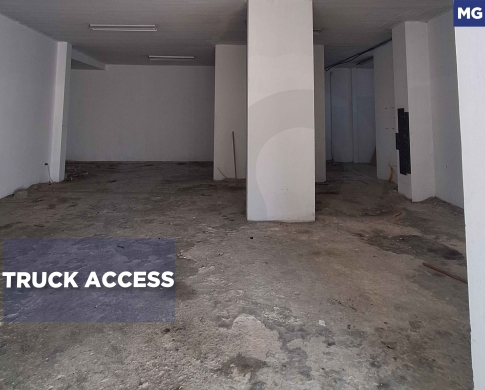 RENTAL/WAREHOUSE/main road/Ceiling heigh/blat,jbeil/بلاط / REF#MG139001 !