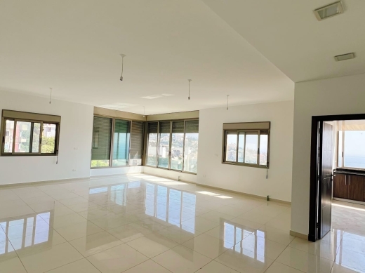 An Apartment With A Small Backyard For Sale in Jbeil