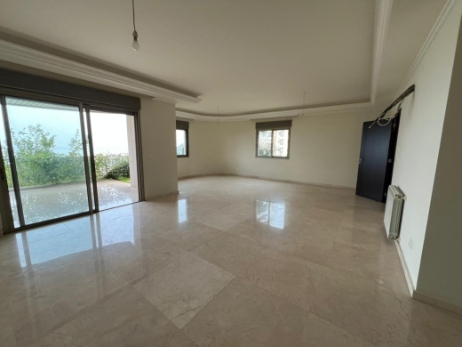 Spacious Apartment With A Big Garden For Sale in Kfarhbeib