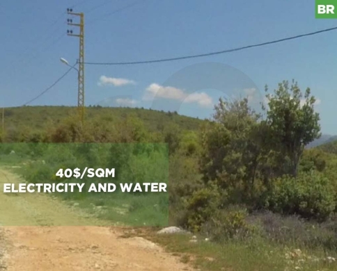 40$/sqm, electricity and water, Derbella, Koura/دربيلا REF#BR134765
