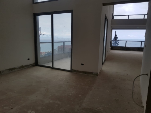 An Amazing Duplex with a Garden and Sea View for Sale in Sahel Alma