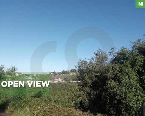 LAND WITH AN OPEN VIEW IN KFOUN,JBEIL/كفون/Zoning : 25/50 / REF#NI140180 !