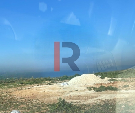 R9-2117 Land for Sale in Rasmaska – Talet Naji, Koura, 1,200 m², Zoning 20/60 — 2