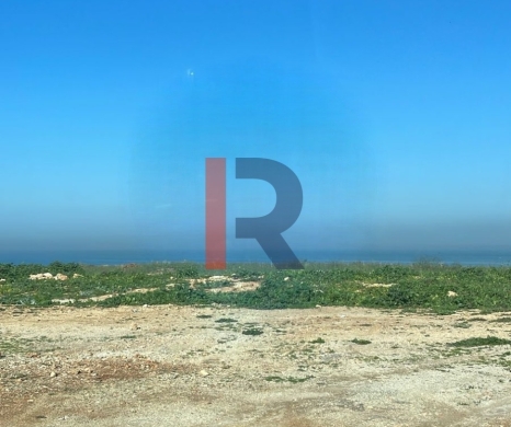 R9-2117 Land for Sale in Rasmaska – Talet Naji, Koura, 1,200 m², Zoning 20/60
