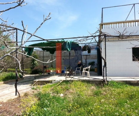 R9-613 Land for Sale in Qsair Akkar – 1,750 m²,Exclusive Price — 12