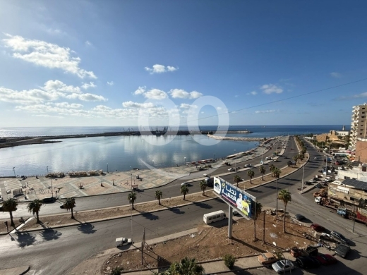 Apartments for sale in Corniche El Baher - شقة على الكورنيش البحري نصف مفروشة مع مطل كاشق شمالا وجنوبا لا يحجب
