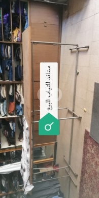 تصفية على محل البسة قديمة ستاندات حديد لتعليق الألبسة رفوف خشب البسة وان دولار — 3