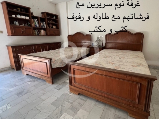 Bedroom dans Dar al Tawlid - Bedroom 2 beds with mattresses plus desk and shelf plus cloth hanger