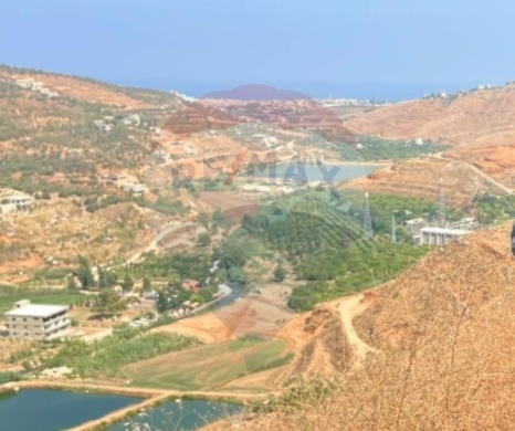 Lands for sale in Aicha Bakkar - R9-2878 Agricultural Land for Sale in Akkar - 1000 m² with Road Access