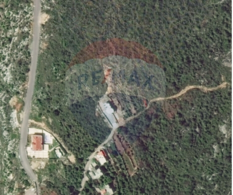Lands for sale in Aicha Bakkar - R9-2880 Land for Sale in Rahbeh Akkar - 8590 m² Villa Zone with Mountain View