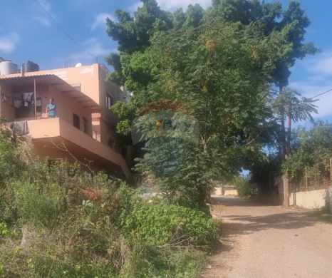 R9-2907 Land for Sale in Nakhleh Koura – 1,400 m² Residential, Zoning 25/50 — 3