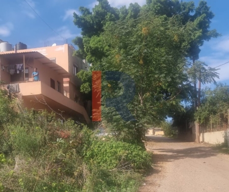 R9-2907 Land for Sale in Nakhleh Koura – 1,400 m² Residential, Zoning 25/50 — 3