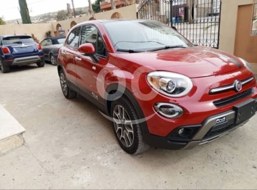 Fiat in Tripoli - فيات 500X موديل 2021 بحالة الوكالة ولون أحمر جذاب | 2021 Fiat 500X in Pristine Condition - Red