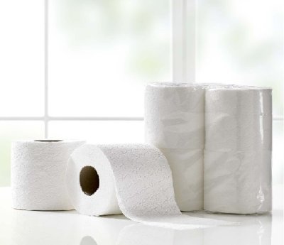 Hyclenz toilet rolls on table with window background