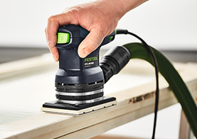 electric sander in use