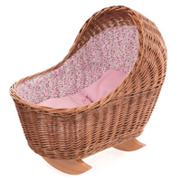 Toy wicker rocking cradle with floral bedding