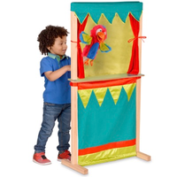 Child playing with wooden puppet theatre and shop - theatre side