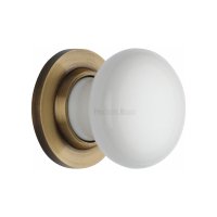 5010-AT - White Knob With Antique Brass Base