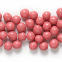 round pink sphere shiny pearls ruby chocolate