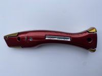 GUPPY DOLPHIN KNIFE GOLD/RED